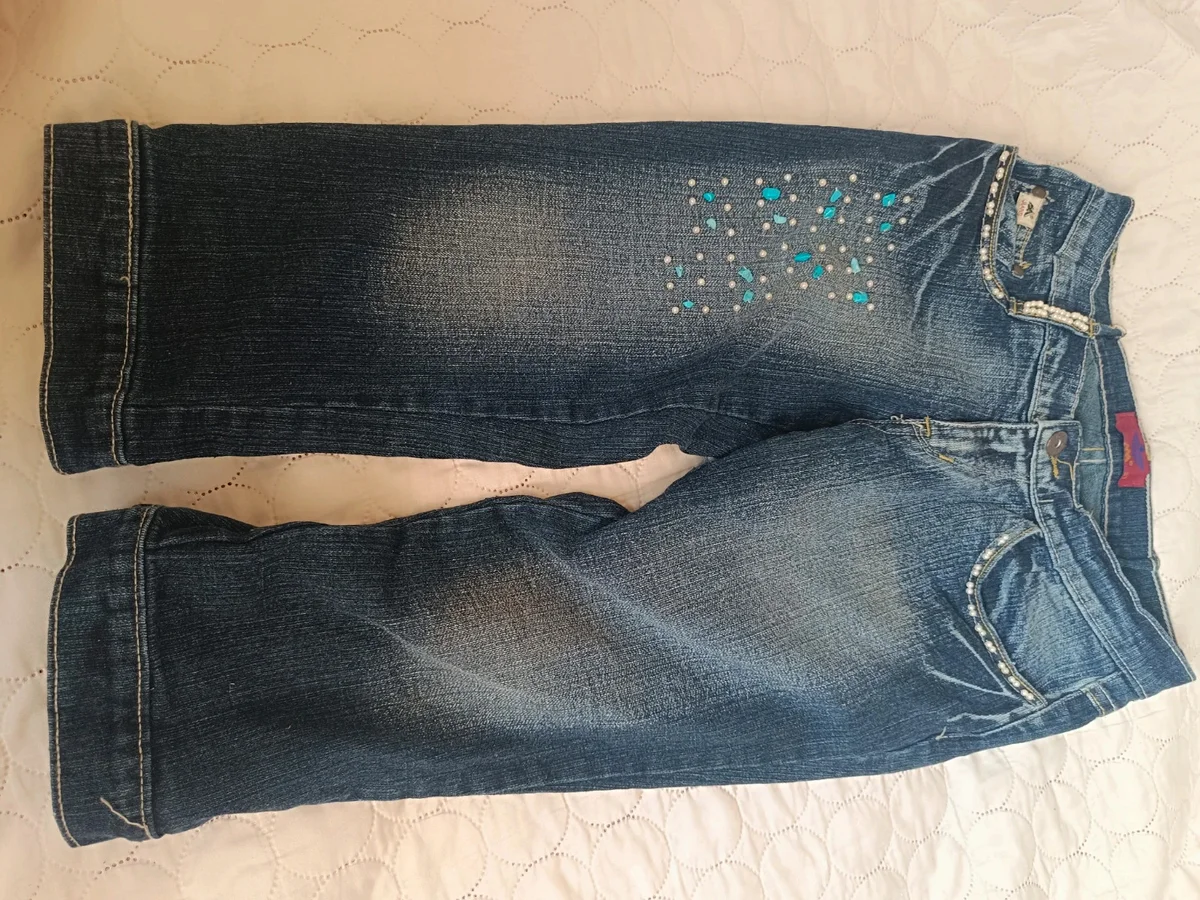 Pantaloni trei sferturi de blug pentru femei.Mărimea 27,cu perlute și